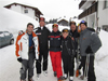 A group of skiers celebrate their run into a rural 
                        mountain village deep in the Austrian Arlberg with their 
                        Mountain Ski Guide