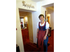 Hotel Staff in Color Austrian traditional dress greats 
                        visitors