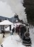 Skiers & riders arrive aboard Loons Steamtrain  at base area RR station at Loon.  The 1934 circa train hauls skiers and tourists between base areas at Loon Mt